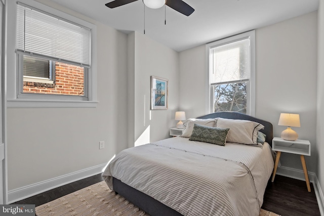 bedroom featuring wood-type flooring and ceiling fan