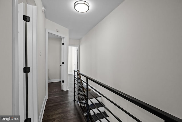 hall with dark hardwood / wood-style floors