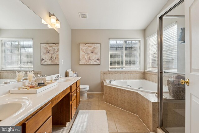 full bathroom featuring tile patterned floors, toilet, separate shower and tub, and vanity