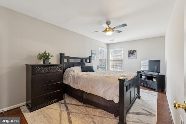 bedroom with light hardwood / wood-style floors and ceiling fan