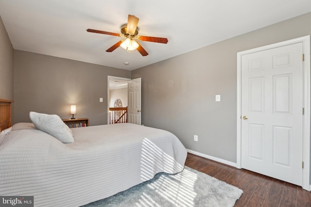 bedroom featuring dark wood-type flooring and ceiling fan