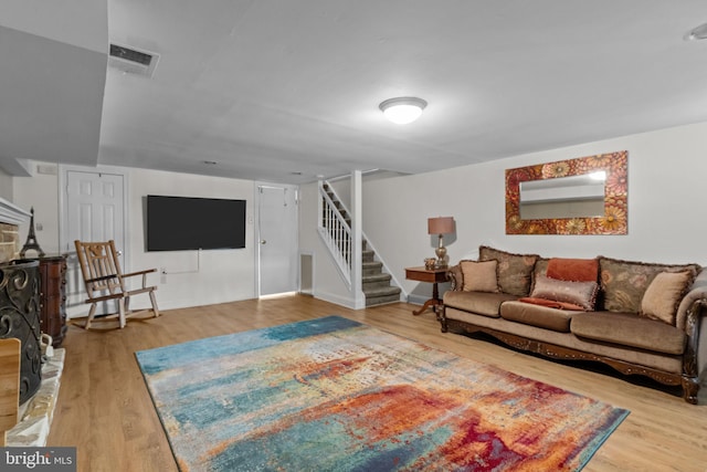 living room with wood-type flooring