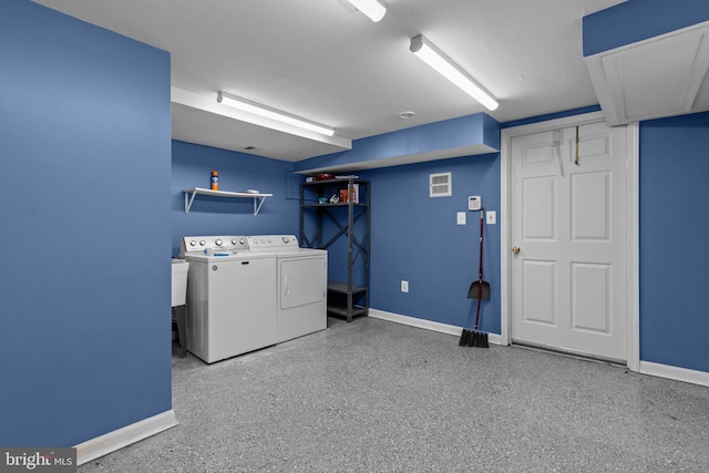 washroom with separate washer and dryer