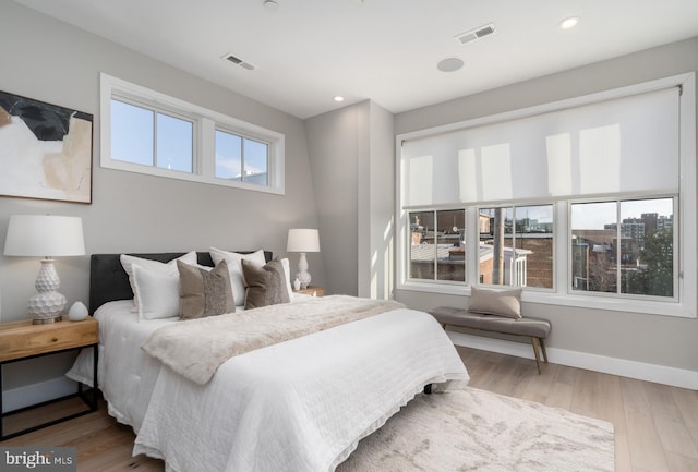 bedroom featuring light hardwood / wood-style flooring