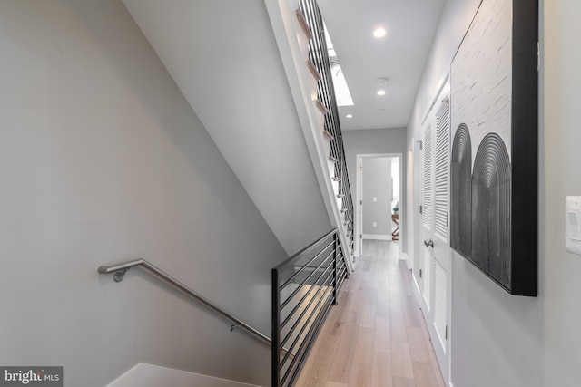 stairs with wood-type flooring