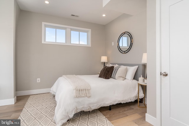 bedroom with light wood-type flooring