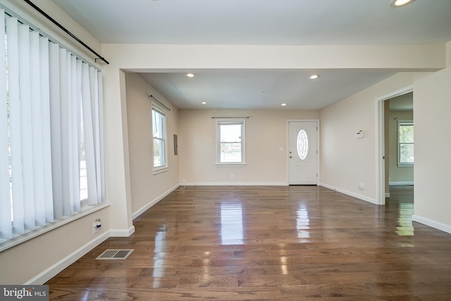 foyer entrance featuring dark hardwood / wood-style flooring