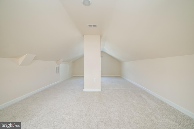 bonus room featuring vaulted ceiling