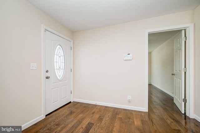 foyer entrance featuring dark hardwood / wood-style floors