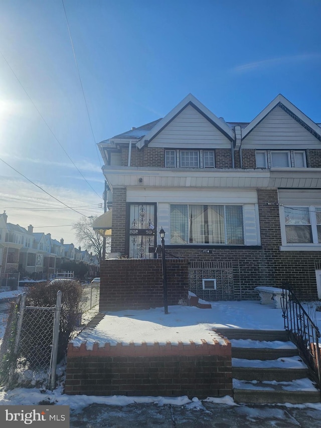 view of snow covered house