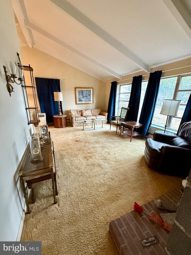 carpeted living area with lofted ceiling with beams