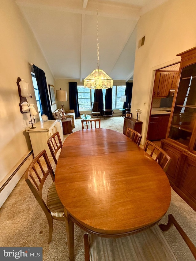 dining room with visible vents, high vaulted ceiling, a notable chandelier, a baseboard radiator, and light colored carpet