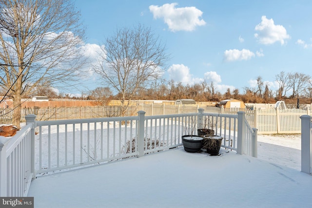 view of snow covered patio