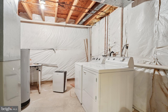 laundry room featuring separate washer and dryer