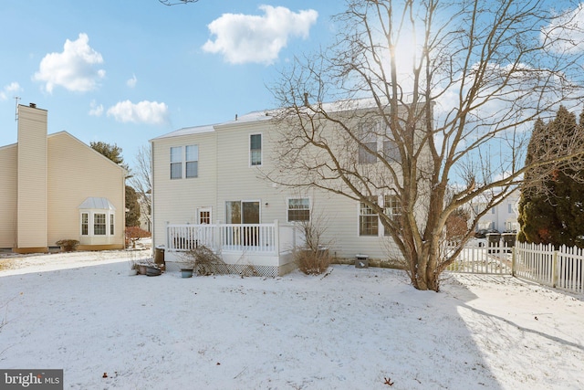 view of snow covered house