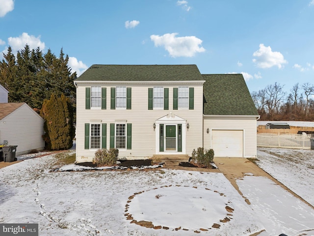 view of front of property featuring a garage