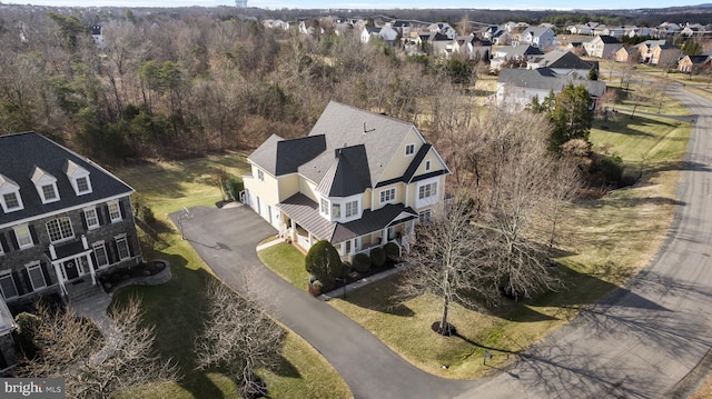 drone / aerial view featuring a residential view