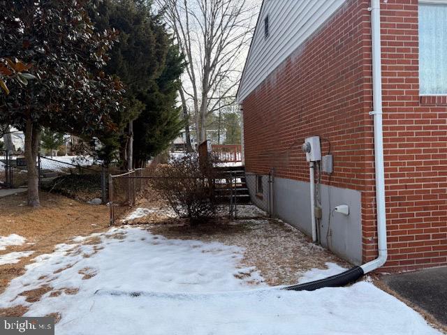 view of snow covered property