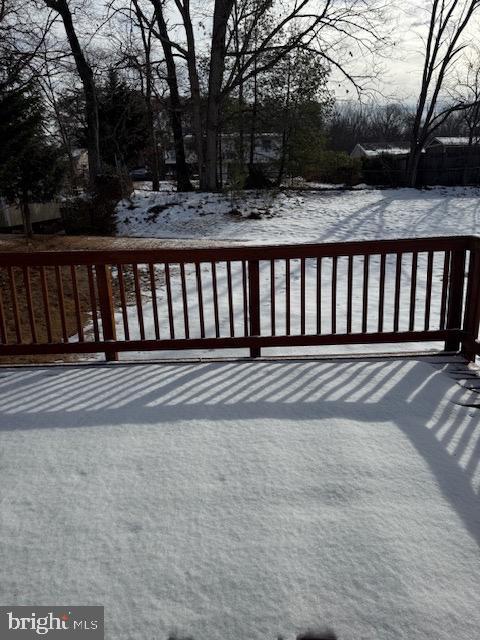 view of snow covered deck