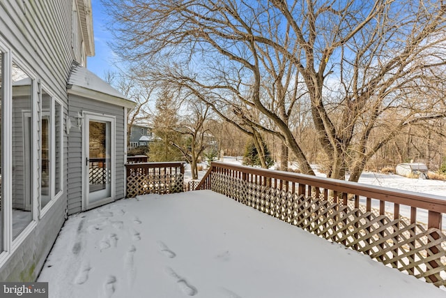 view of snow covered deck