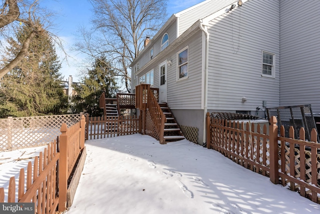 view of yard covered in snow