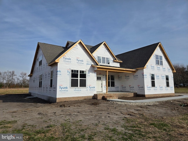 property in mid-construction featuring a porch