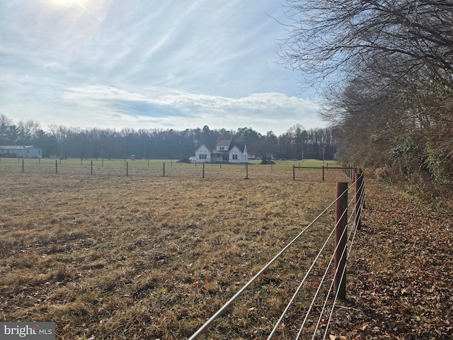 view of yard featuring a rural view