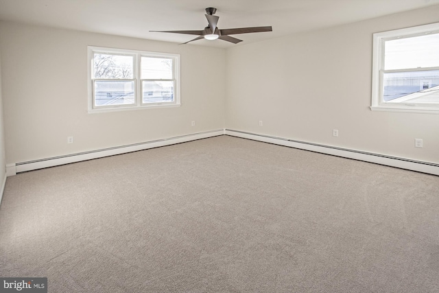 unfurnished room with plenty of natural light, carpet, ceiling fan, and baseboard heating