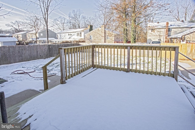 view of snow covered deck