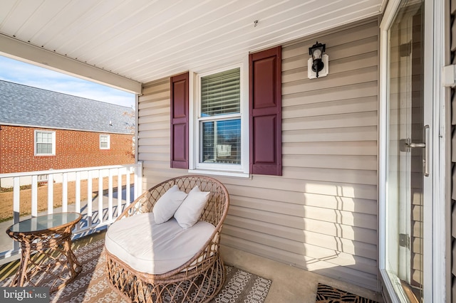 balcony featuring a porch