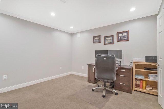 carpeted office space featuring ornamental molding