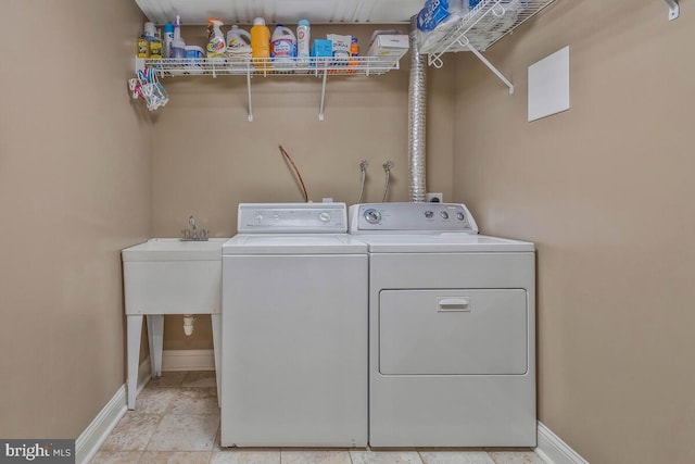 washroom featuring independent washer and dryer