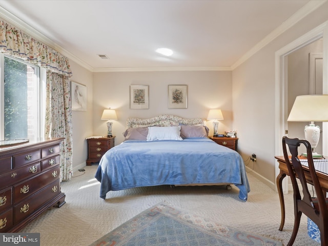 bedroom with crown molding and light colored carpet