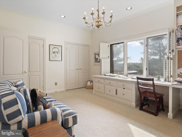 interior space featuring crown molding, a chandelier, light carpet, and built in desk