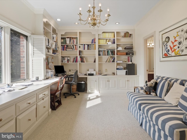 office area with light colored carpet, ornamental molding, built in desk, and a notable chandelier