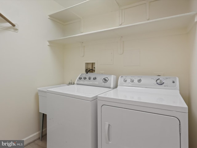 laundry room featuring washer and dryer