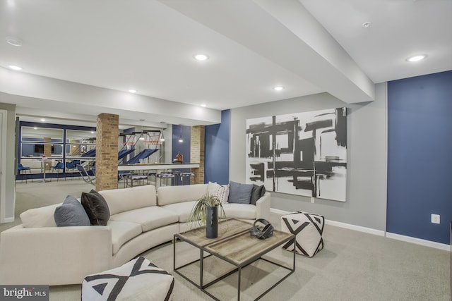 carpeted living room with bar area