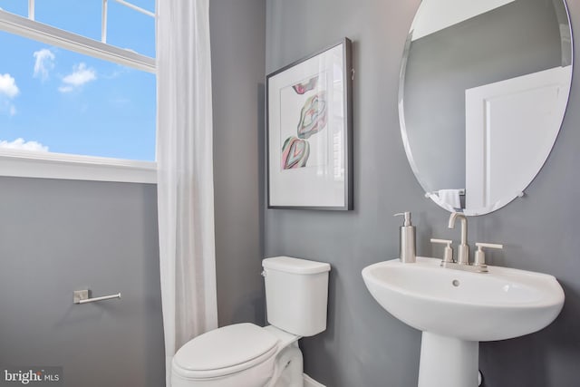 bathroom with sink and toilet