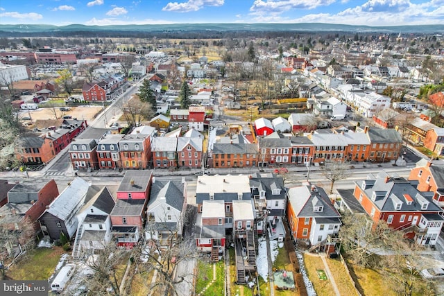 drone / aerial view featuring a mountain view