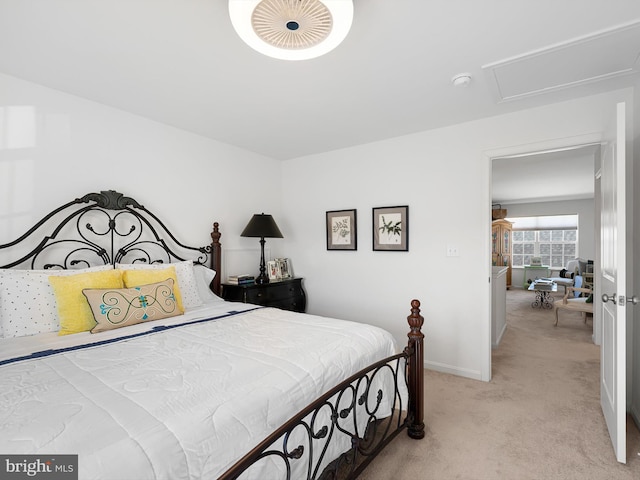 bedroom with light colored carpet