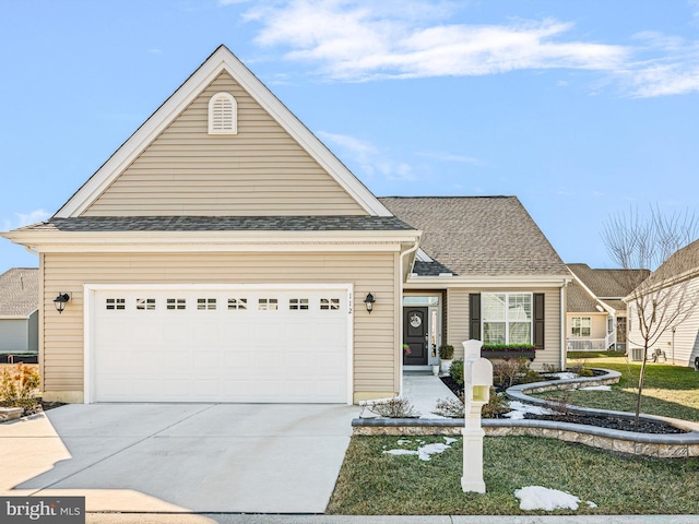 view of front of property with a garage