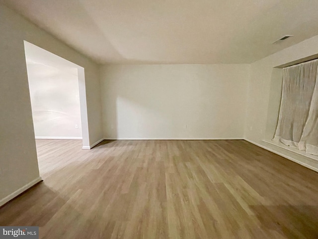 empty room with light wood-type flooring