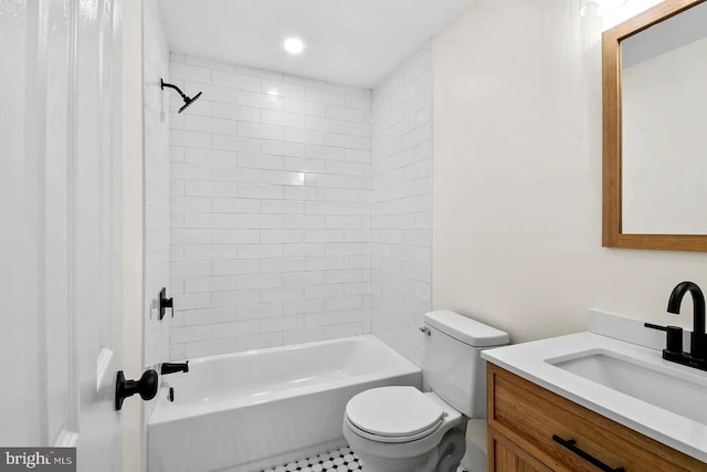 full bathroom with vanity, toilet, and tiled shower / bath