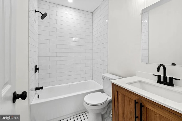 full bathroom with tiled shower / bath combo, vanity, and toilet