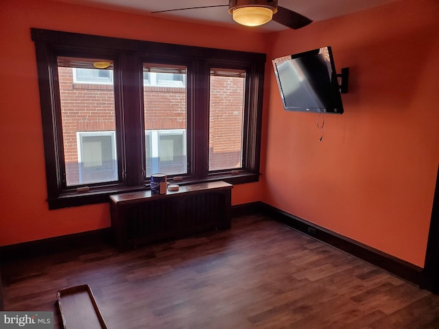 empty room with wood-type flooring