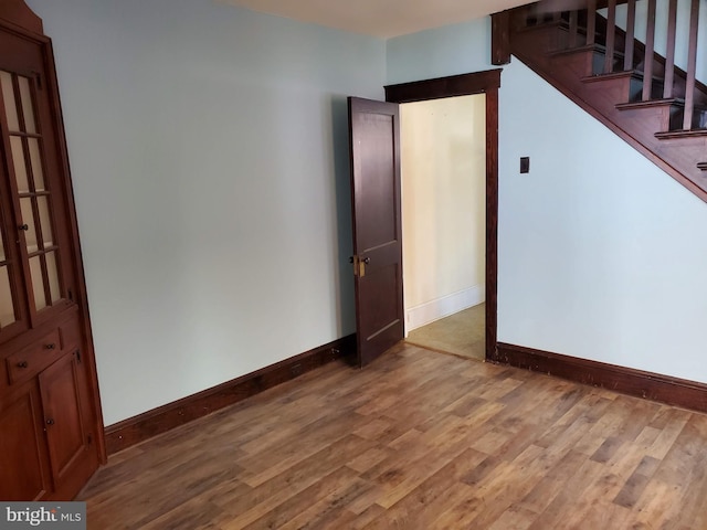 empty room featuring hardwood / wood-style floors