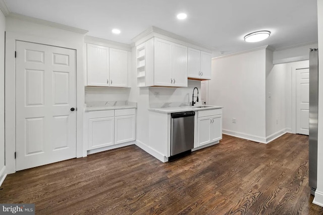 kitchen featuring sink, appliances with stainless steel finishes, dark hardwood / wood-style floors, ornamental molding, and white cabinets