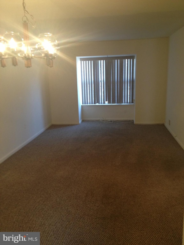 view of carpeted spare room