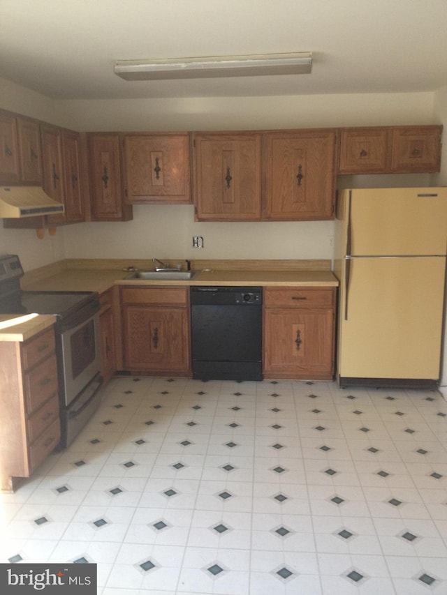 kitchen with sink, fridge, black dishwasher, and stainless steel electric range oven