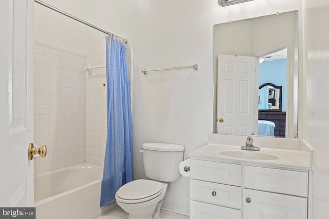 full bath featuring tile patterned floors, shower / bath combo with shower curtain, toilet, connected bathroom, and vanity